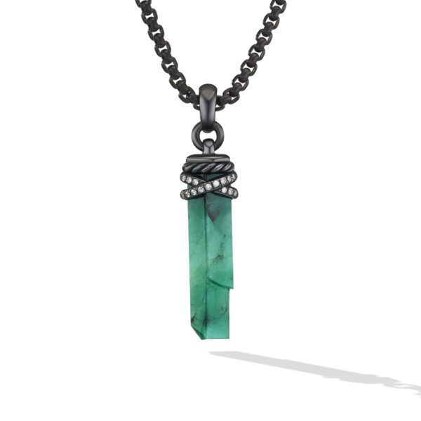 A pendant with a long, rectangular green gemstone decorated with silver and diamond-like accents at the top, attached to a black chain. The pendant features a twisted rope design around the upper part of the gemstone.