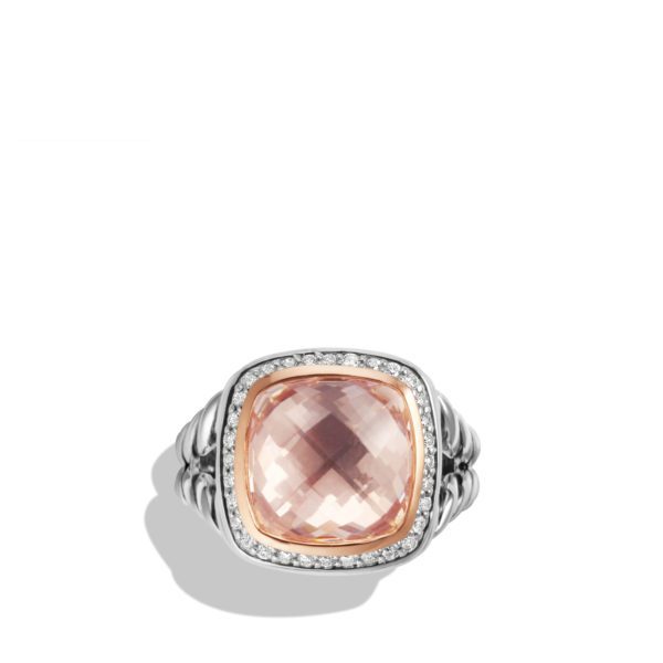 A silver ring featuring a large square-cut pink gemstone surrounded by small diamonds. The band has a ridged design, and the ring casts a slight shadow on the white background.