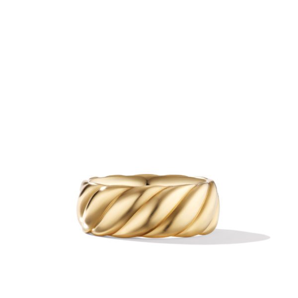 A gold ring with a twisted, rope-like design on a white background. The band is wide and features a smooth, polished finish with a slightly raised, spiraling pattern. Shadow falls to the right side of the ring.