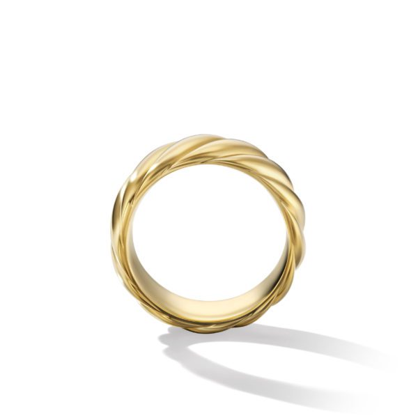 A close-up image of a gold ring with a twisted design on a plain white background. The ring casts a faint shadow underneath, adding depth to the image.