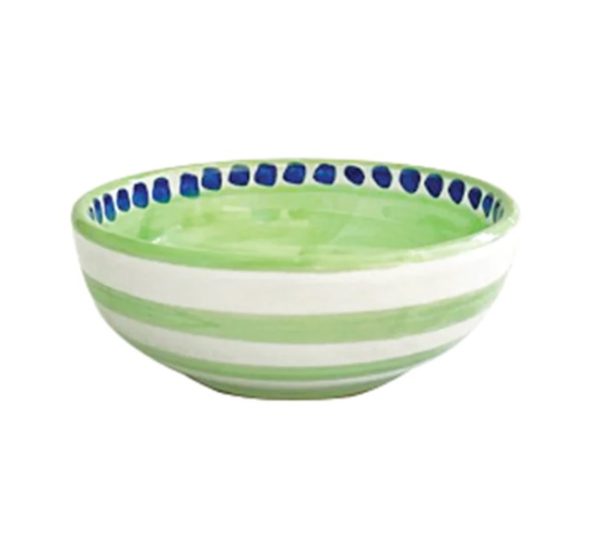 The Vietri Campagna Cane Olive Oil Bowl features a green interior and green horizontal stripes on the exterior. The rim of the bowl is adorned with a pattern of small blue dots, and it has a glossy finish.