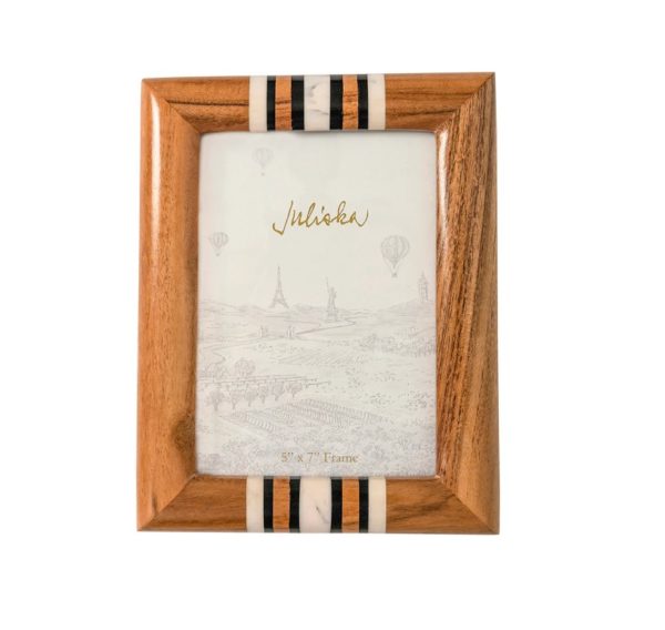 The Juliska Stonewood Stripe Frame - 5 x 7 is an analog photo frame with a wooden border featuring diagonal black and white marble inlays at the top and bottom edges. The frame contains an illustrated placeholder with the word "Juliska" written in cursive at the center.