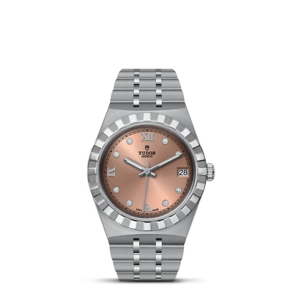 Introducing the TUDOR Royal, a luxurious wristwatch featuring a silver-metal bracelet. Its round, rose-gold dial showcases Roman numerals and diamond hour markers, complemented by a date window at 3 o'clock. The watch is elegantly finished with a fluted bezel design.