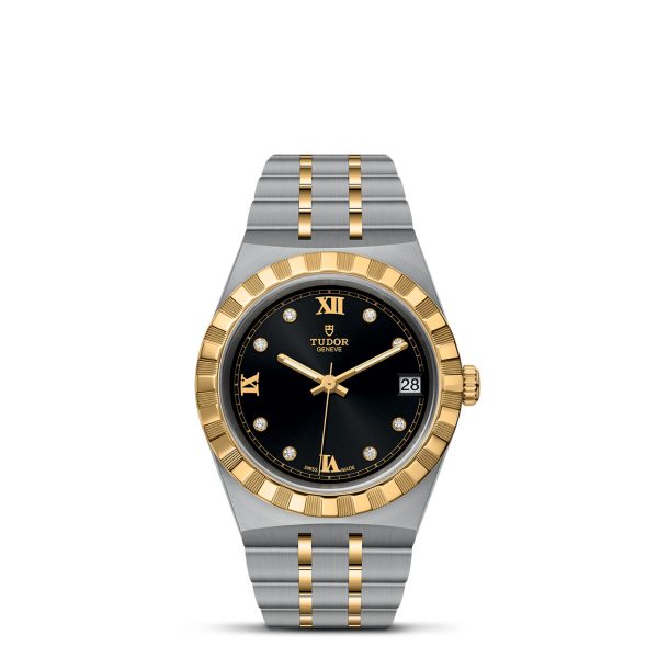 The TUDOR Royal luxury wristwatch boasts a black dial adorned with gold Roman numeral hour markers and diamond markers, complemented by a date display at 3 o'clock. Its elegant two-tone bracelet features steel and gold links paired with a fluted gold bezel.