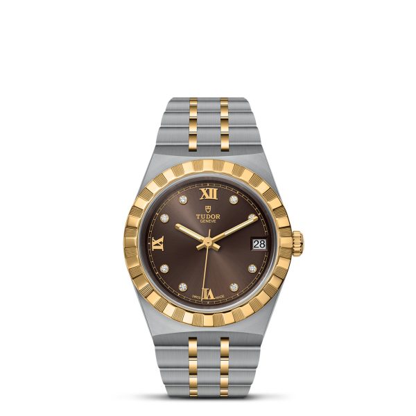 The TUDOR Royal is a sophisticated wristwatch showcasing a two-tone bracelet crafted from stainless steel and yellow gold. It features a brown dial adorned with Roman numeral and diamond hour markers, complemented by a fluted gold bezel and a date display at the 3 o'clock position.