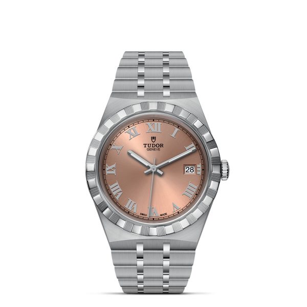 Introducing the TUDOR Royal: a silver wristwatch featuring a metallic bracelet with a brushed finish. The timepiece boasts a pink dial adorned with silver Roman numerals and hands. A date window is conveniently located at the 3 o’clock position, with the iconic "TUDOR" brand name elegantly positioned below the 12 o’clock numeral.