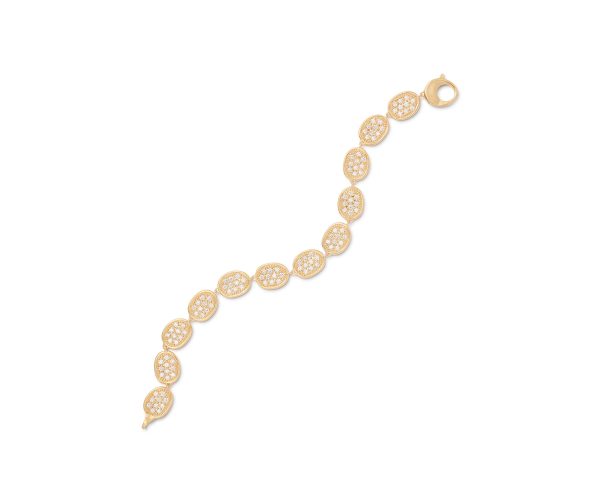 The Marco Bicego Lunaria Pave Diamond Link Bracelet is showcased on a plain white background, arranged in a gentle curve. It features round, linked segments adorned with intricate floral patterns comprised of small clear stones.