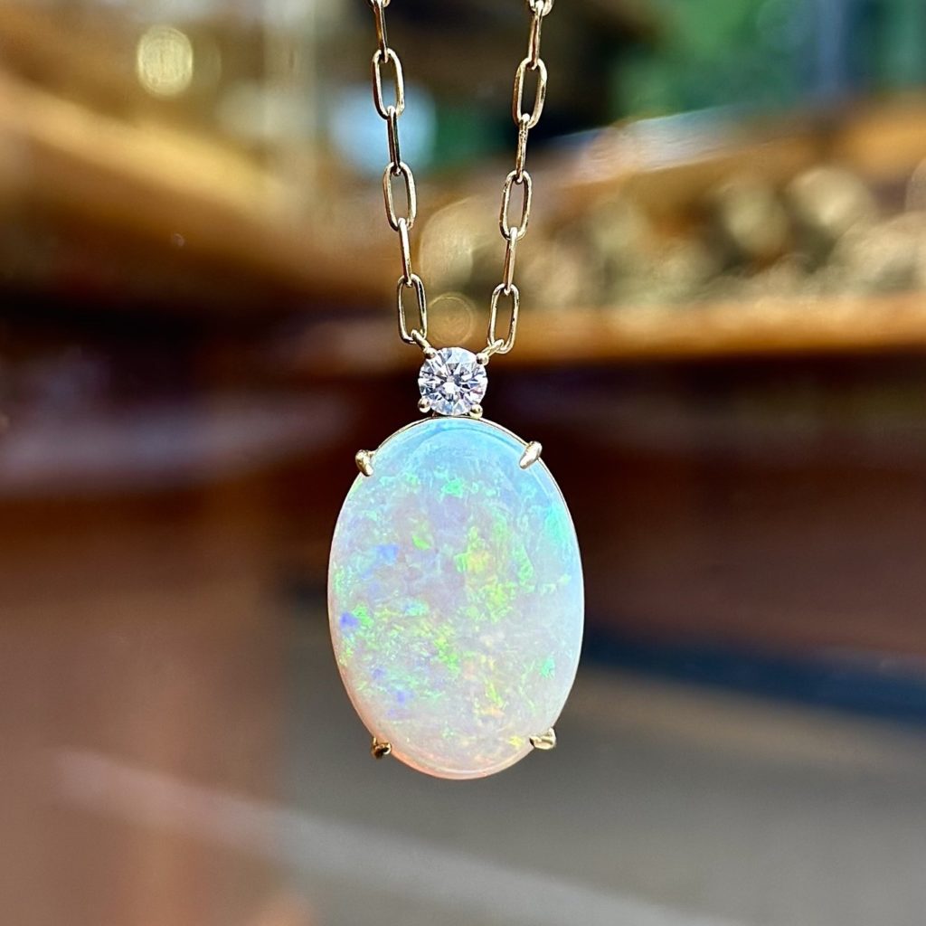 Nearly 16 carat kaleidoscopic opal pendant