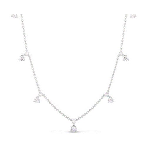 The Roberto Coin Diamonds by the Inch Dangling 5 Station Necklace is a delicate silver necklace adorned with small, evenly spaced, teardrop-shaped diamond pendants along the chain. The central pendant is slightly larger than the others, showcasing a minimalist and elegant design.