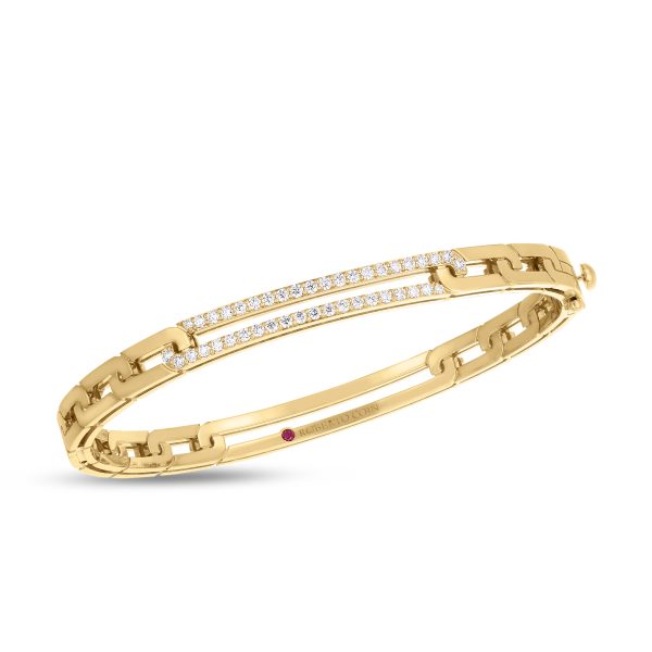 The Roberto Coin Navarra Pave Extended Link Bangle showcases a gold bracelet with a unique link design and two parallel rows of diamonds, offering an elegant and luxurious appearance.