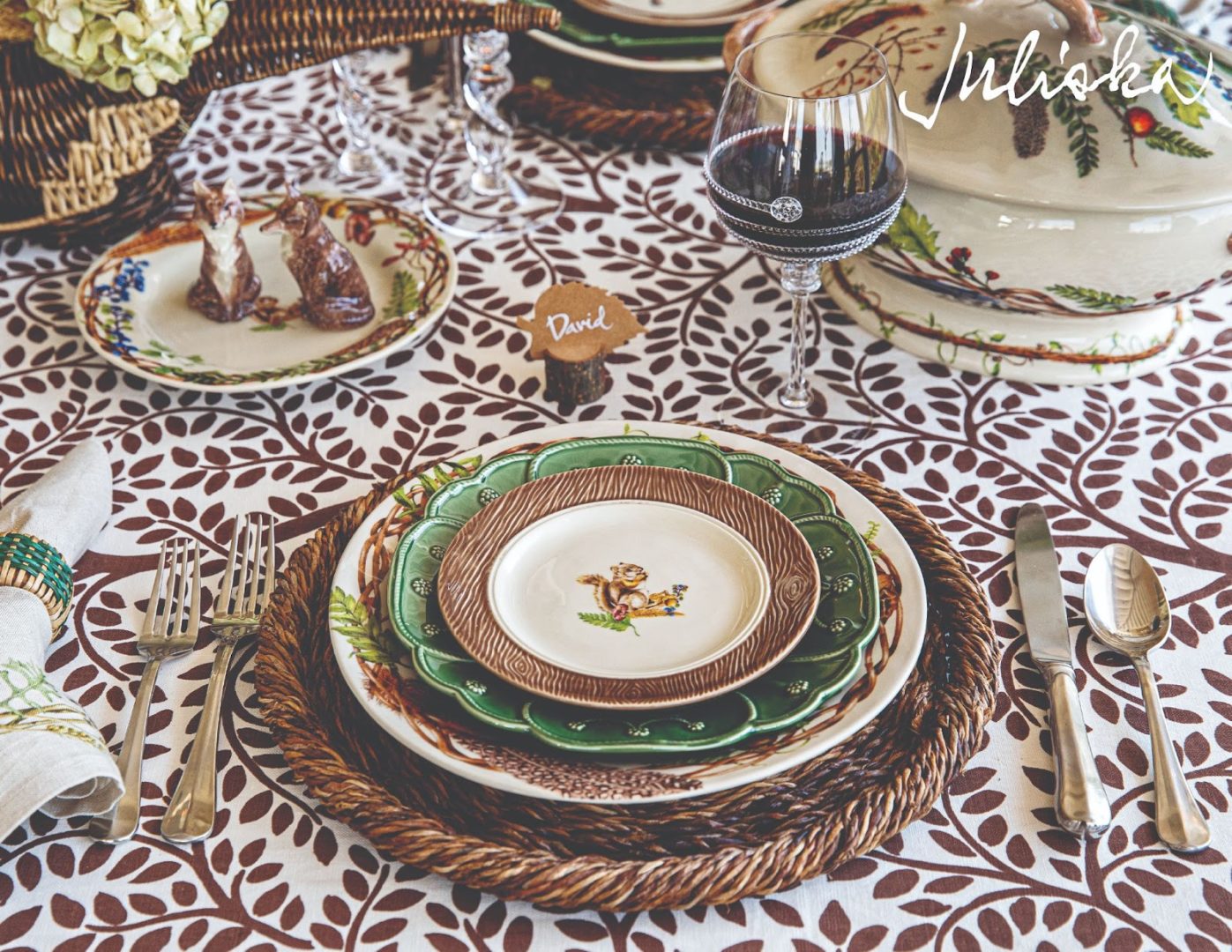 Juliska tablescape with rustic rope charger, Veronica Beard Jardins Du Monde, and Forest Walk patterns.