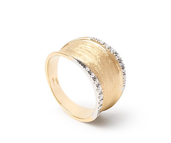 The Marco Bicego Lunaria Diamond Band is a gold ring with a wide, textured band adorned with two rows of small, sparkling diamonds along its edges. Its brushed finish enhances the elegance of the design.