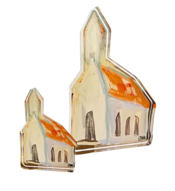 Two abstract paintings of beige churches with red-orange roofs, characterized by arched windows and doors. The artwork features loose, expressive brushstrokes and a bright, minimalistic color palette. One painting is the Lauren Dunn Church with Orange Roof Acrylic Block - Small, positioned slightly to the left in front of the larger painting.