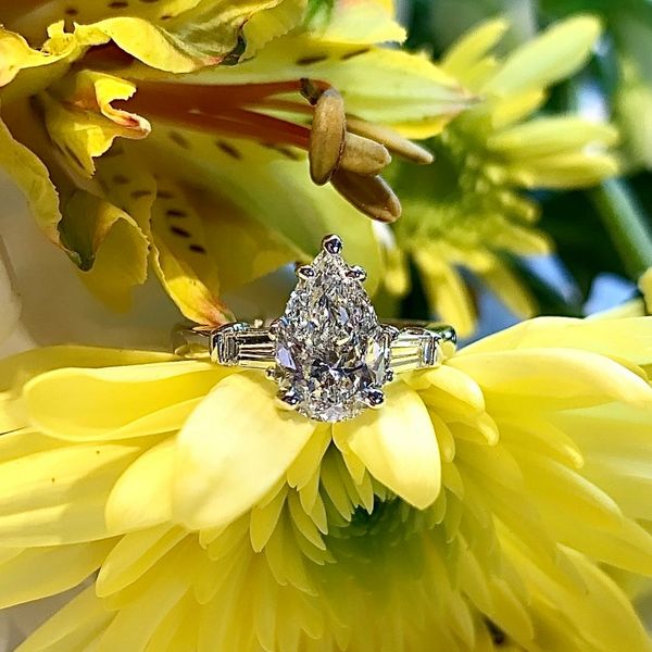 A custom, pear-cut engagement ring made by Master Jeweler Philip Flenniken