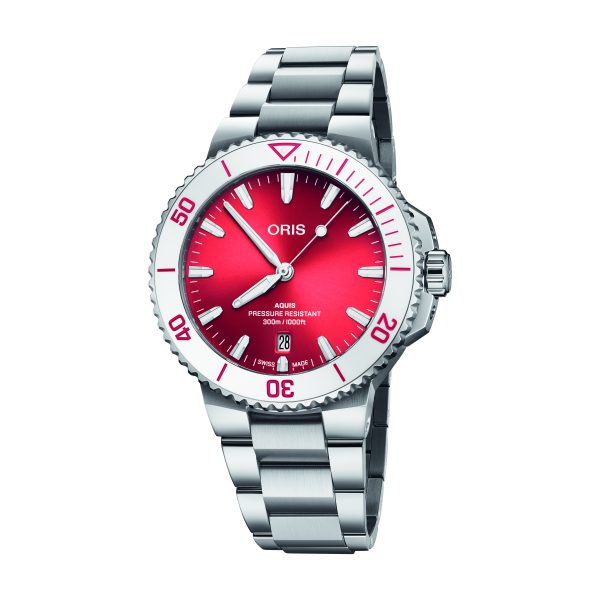 The Oris Aquis Date - Taste of Summer is a luxury stainless steel watch that boasts a vibrant red dial and bezel. The dial features the ORIS logo, a date window at 3 o'clock, and white hour markers and hands. The unidirectional bezel showcases white and red detailing. Complementing the design, the bracelet is crafted from stainless steel as well.