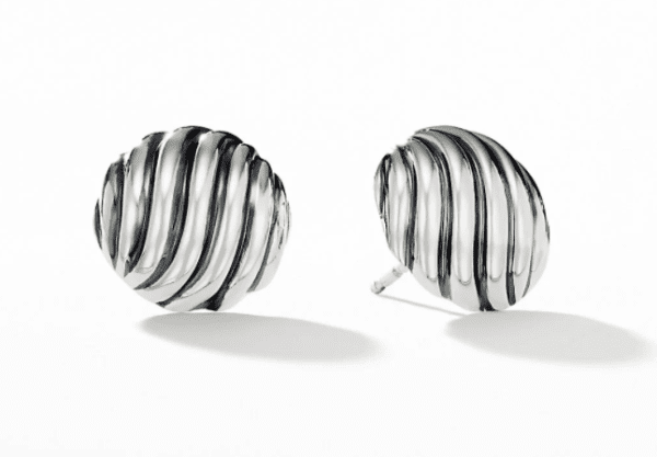 The SCULPTED CABLE STUDS are a pair of round sterling silver earrings featuring a twisted, spiral design on a white background. They have a shiny, polished finish that beautifully reflects light.