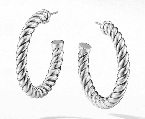 A pair of CABLE HOOP EARRINGS are displayed against a white background. The earrings feature a thick, rope-like design and are semi-circular in shape, with the posts visible at the top.