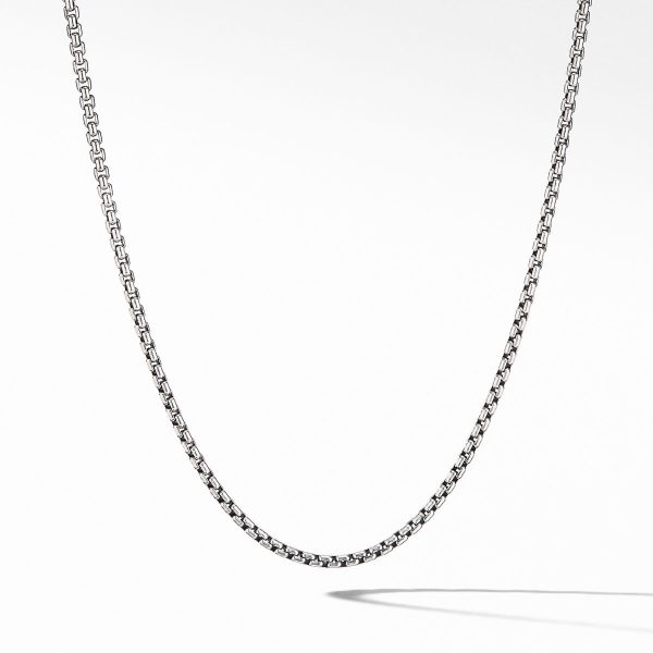 The 2.7MM MENS BOX CHAIN is displayed against a plain white background. Finely crafted, its simple and elegant design casts a subtle shadow beneath it.