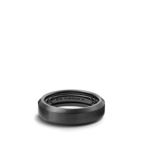 The 6MM BEVELED BAND, a sleek titanium ring with a matte finish, features the engraving "© D. Yurman Ti" on the inner side. Set against a plain white background, its modern and minimalist design is beautifully highlighted.