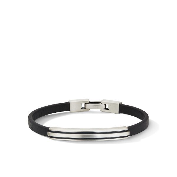 The 7MM DECO ID BRACELET is a sleek black leather accessory that features a silver-toned metal accent and clasp. Displayed on a white background, this bracelet highlights its minimalist and modern design.