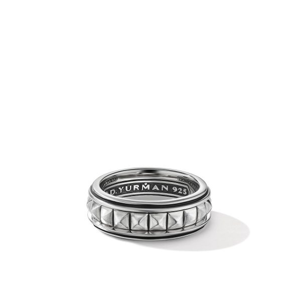 The sterling silver PYRAMID BAND RING showcases a geometric pattern with a smooth inner band engraved with "D. Yurman 925." The ring features a triangular pyramid design encircling the exterior, set against a white background that casts a slight shadow beneath the piece.