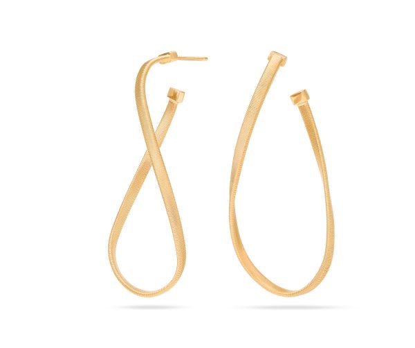 Introducing the Marco Bicego Marrakech Twisted Coil Hoop Earrings, a pair of gold-toned hoops with a sleek, smooth texture. These earrings feature an elegant, modern design with one end gracefully curving over the other, set against a plain white background.