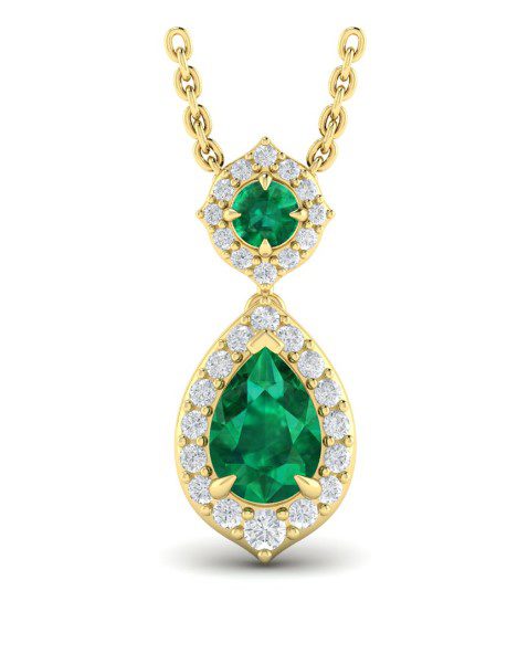 The Vlora Emerald and Diamond Drop Necklace boasts an elegant pendant with two vivid green emeralds surrounded by sparkling white diamonds. The lower emerald is teardrop-shaped, while the upper emerald is circular. The intricate gold chain adds to the eye-catching design of this exquisite piece.