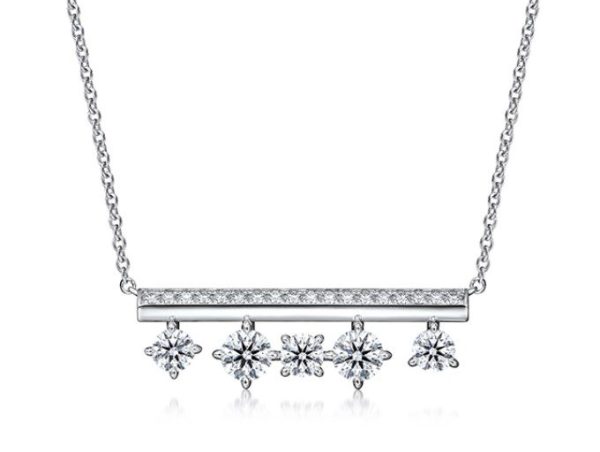 The Hearts on Fire Barre Floating Diamond Pendant Necklace features a horizontal bar encrusted with small diamonds. Below the bar, four symmetrical diamond-shaped stones dangle, each securely held in place by prongs. The necklace is complemented by a simple and elegant chain against a plain white background.