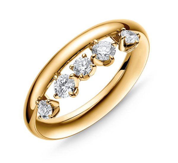 The Hearts on Fire Barre Floating Diamond Ring features a smooth, polished gold band adorned with five evenly spaced, sparkling round diamonds set in a minimalistic design. The diamonds are held in place by small prongs, showcasing a classic and elegant jewelry piece.