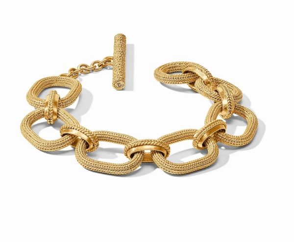 The Julie Vos Cheval Link Bracelet showcases large, textured oval and square links paired with a T-bar clasp. Each intricately designed link enhances its luxurious and sophisticated appearance against a plain white background.