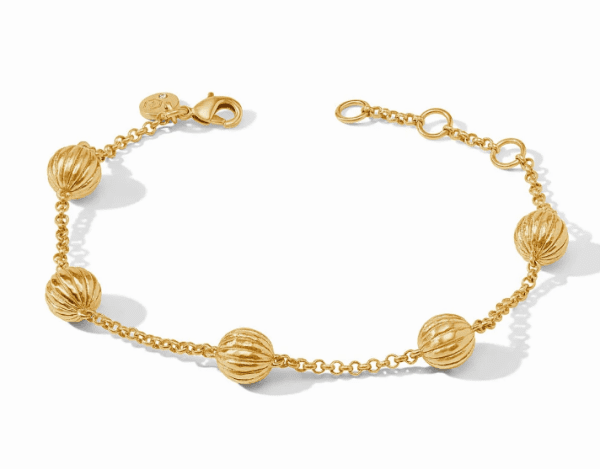 Julie Vos Cirque Delicate Bracelet featuring a chain link design with six round, ridged beads evenly spaced along the chain. The bracelet has a lobster clasp closure and an adjustable chain with three extra loops.