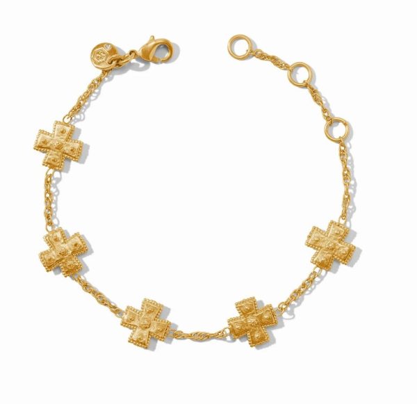 The Julie Vos Canterbury Delicate Bracelet features intricately designed cross-shaped links connected by delicate chain segments. The bracelet includes an adjustable clasp, allowing for different fit sizes. The cross links have detailed patterns, giving the bracelet an ornate appearance.