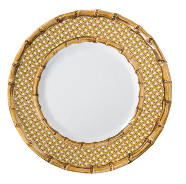 The Juliska Bamboo Caning Melamine Dinner Plate - Natural showcases a gold, bamboo-like pattern on both its rim and inner ring, complemented by a plain, reflective silver surface at its center. Its intricate design beautifully combines natural bamboo elements with elegant tableware styling.