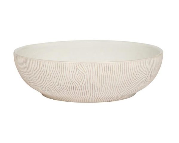 Introducing the Juliska Blenheim Oak Coupe Bowl: a round, off-white ceramic bowl featuring a delicate, textured exterior pattern that mimics the appearance of wood grain. This bowl boasts a slightly flared rim and a smooth, pristine interior. Perfect for serving food or as an elegant decorative piece.