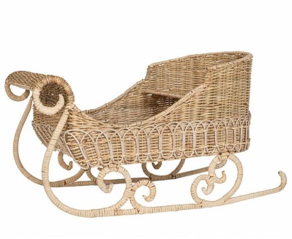 The Juliska Provence Rattan Sleigh boasts intricate woven details and features elegantly curled decorative rails at the front along with simple runners below. This sleigh comes in a natural beige color and includes a high backrest, making it perfect for decorative or light-use purposes.