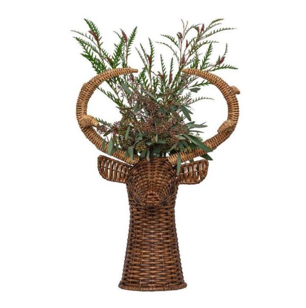 A Juliska Devon Willow 22" Stag Vase, creatively designed to resemble a deer's head with majestic antlers, elegantly filled with assorted green foliage and delicate flowers.