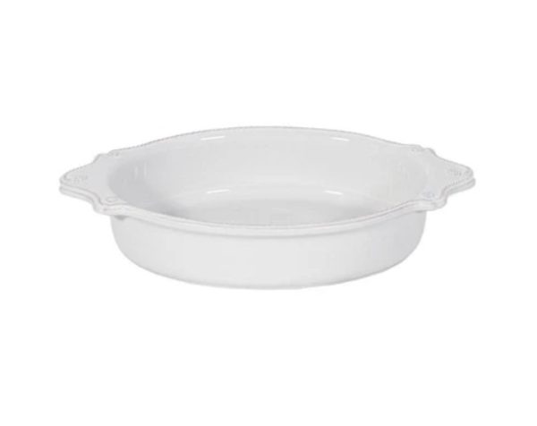 The Juliska Berry & Thread 13" Oval Baker in Whitewash features a white, oval ceramic design with subtle fluted edges and two small handles on either side. It boasts a smooth surface and a glossy finish, beautifully displayed against a white background.