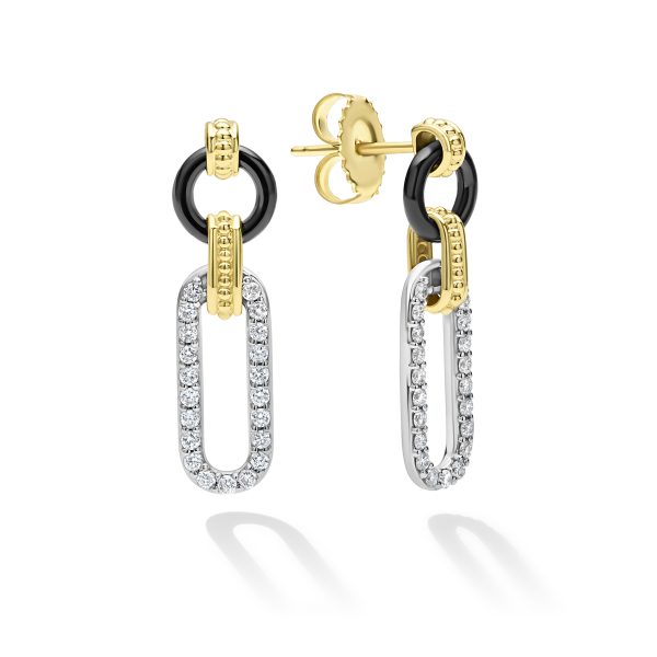 Introducing the LAGOS Signature Caviar Small 18K Gold and Black Ceramic Diamond Link Drop Earrings — an elegant pair of drop earrings featuring a sophisticated combination of black, gold, and silver tones. These earrings showcase black ceramic and 18K gold circular links connected to elongated silver loops embellished with sparkling diamonds. They are designed with secure push-back closures for a comfortable fit.