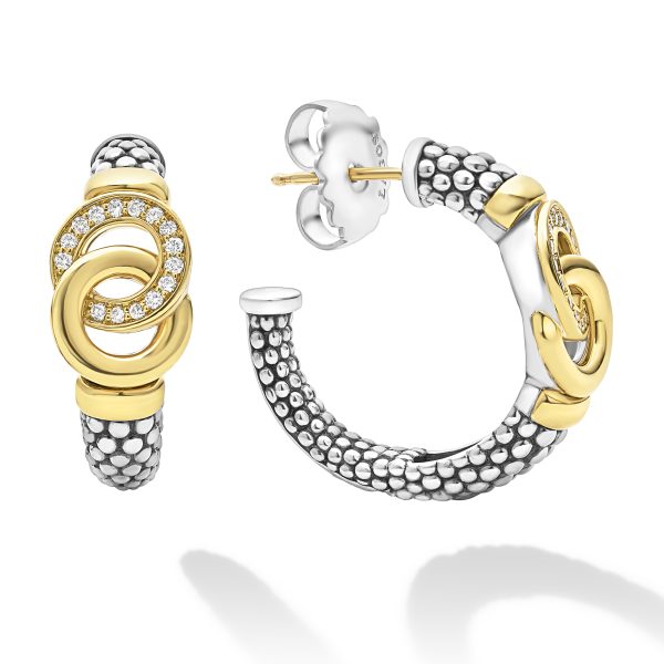 The LAGOS Signature Caviar Two-Tone Interlocking Diamond Hoop Earrings showcase an elegant and unique design with interlocking gold and silver loops adorned with small diamonds. These hoops feature a textured silver pattern, creating a stunning combination of metallic hues and intricate detailing.