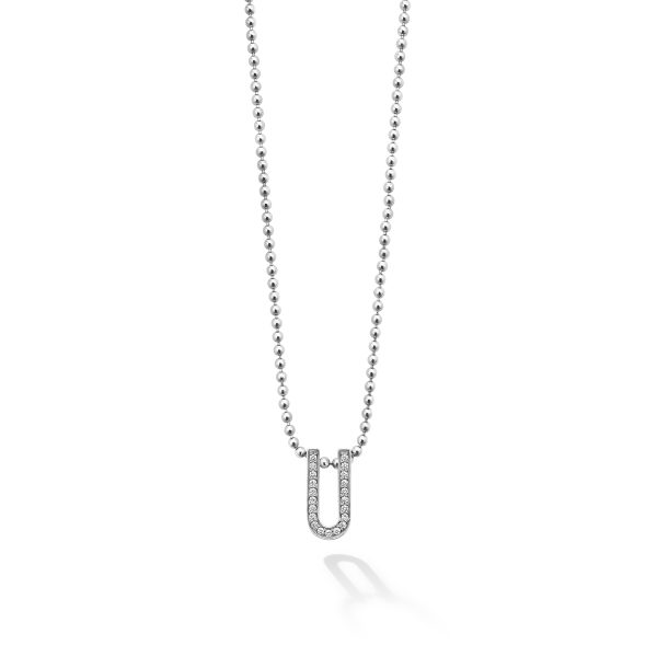 The LAGOS Caviar Spark Small Linear Diamond Pendant Necklace features a delicate silver chain adorned with small round beads. The pendant is a U-shaped charm encrusted with tiny sparkling diamonds, showcasing an elegant and minimalist design.