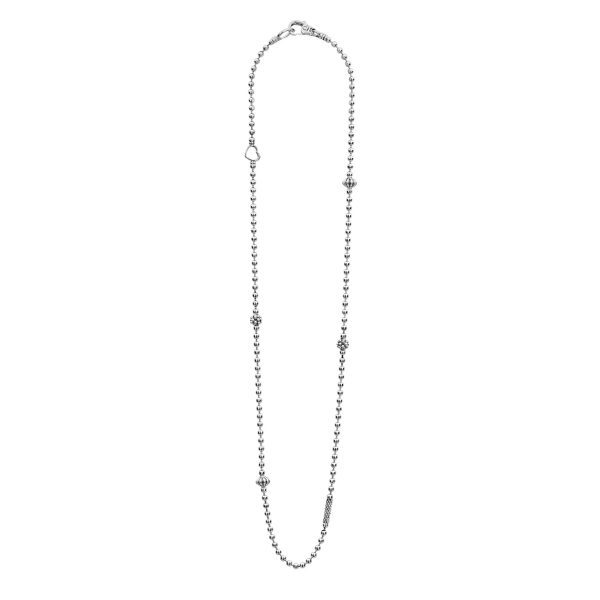 The LAGOS Caviar Icon Silver Caviar Beaded Necklace is a delicate and elegant piece featuring a thin, continuous silver chain adorned with small, evenly spaced spherical beads. Larger decorative bead clusters are interspersed along the chain, enhancing its sophisticated design.