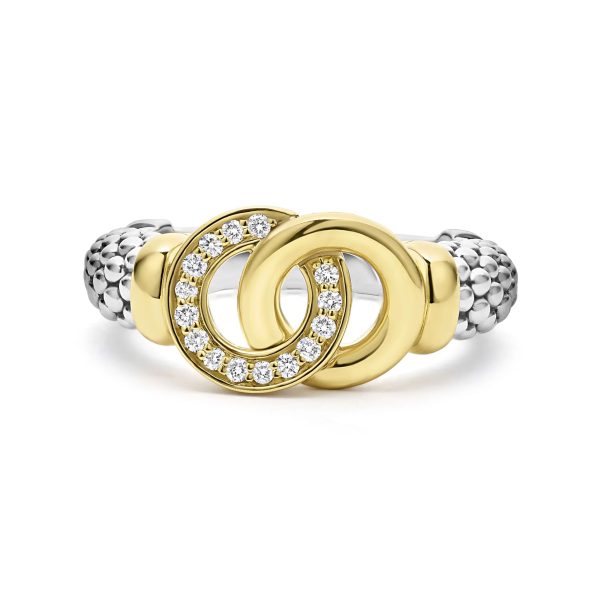 The LAGOS Signature Caviar Two-Tone Interlocking Diamond Ring features a dual-tone design with two interlocking circles: one gold with embedded diamonds and the other plain gold. Both are attached to a silver band with a textured, beaded design.