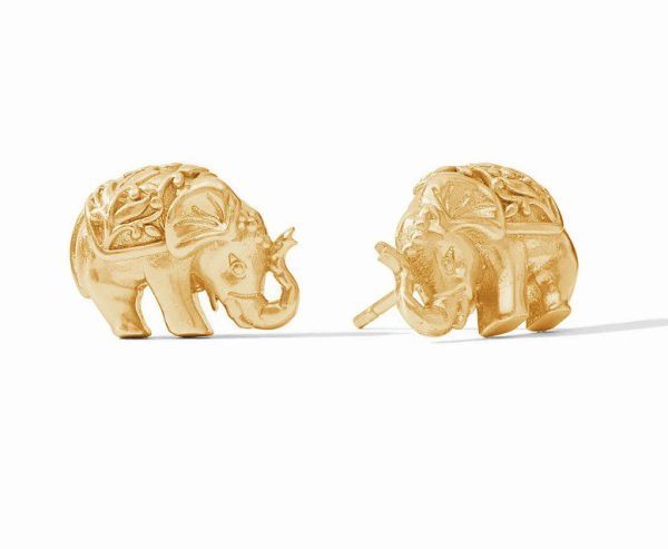 Julie Vos Elephant Stud Earrings, featuring intricate gold elephant designs, are showcased from multiple angles to emphasize their exquisite craftsmanship. One earring is displayed standing upright while the other is tilted forward, each casting soft shadows on a white background.