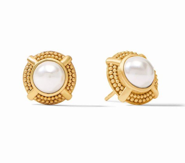 Description: The Julie Vos Cabachon Stud Earrings - Pearl are a pair of gold earrings that feature large, round white pearls at their center. They are adorned with a textured gold border showcasing intricate detailing and crossed gold accents on the sides. The background is plain white.