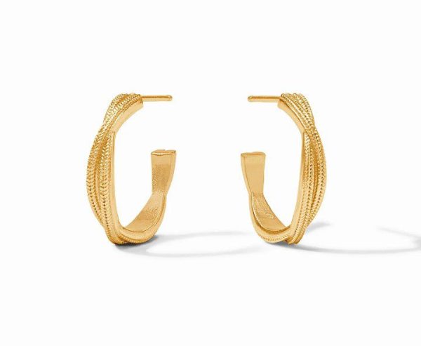 Image of the Julie Vos Cheval Twist Hoop Earrings - Small in gold, showcasing a modern, twisted design. Each earring features a smooth surface combined with intricate braided detailing, creating a sophisticated appearance. The earrings are displayed upright, casting subtle shadows.