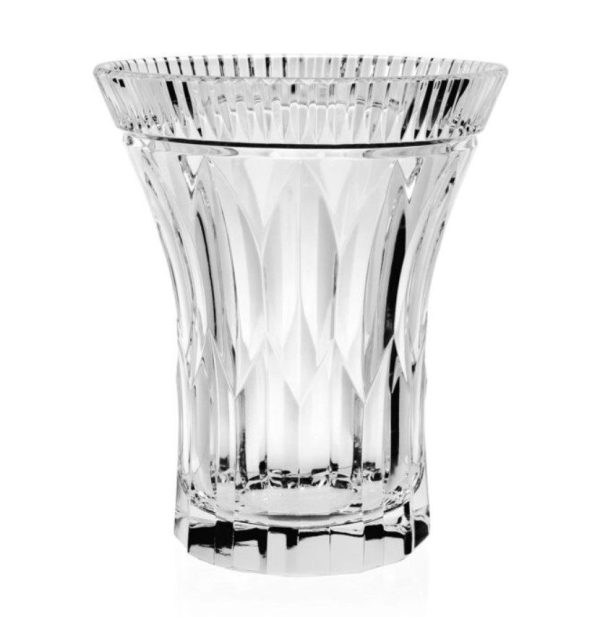 A close-up image of the William Yeoward Cristina Flower Vase - 8" showcasing its clear crystal form with a wide, fluted rim and intricate vertical cut patterns along the body, creating a reflective and elegant design. The vase is placed against a plain white background.