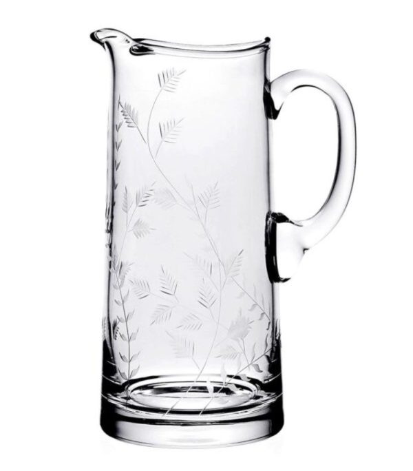 Introducing the William Yeoward Daisy B Pitcher – a tall, clear glass pitcher with a handle. This elegant and understated pitcher is beautifully adorned with delicate, etched botanical patterns of leaves and branches, enhancing the transparency and simplicity of the 3-pint glass design.