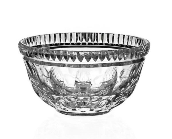 The William Yeoward Kathleen Small Bowl is an intricately designed crystal bowl with a detailed pattern around its rim and sides. The bowl is empty and displayed against a white background, showcasing its elegant transparency and craftsmanship.