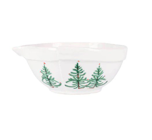 The Vietri Lastra Holiday Small Mixing Bowl is white and features a spout, adorned with green Christmas tree illustrations and small red accents, set against a plain white background.