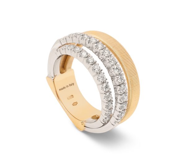 A Marco Bicego ring featuring a yellow gold band with a textured design and four coils. The silver-toned band is adorned with pavé diamonds, and inside, the inscription proudly states "made in Italy.